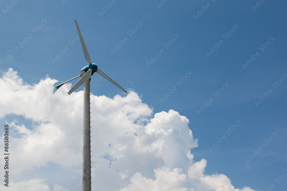 Windmills for electric generator with blue sky and white cloud Windmills for electric generator with blue sky and white cloud