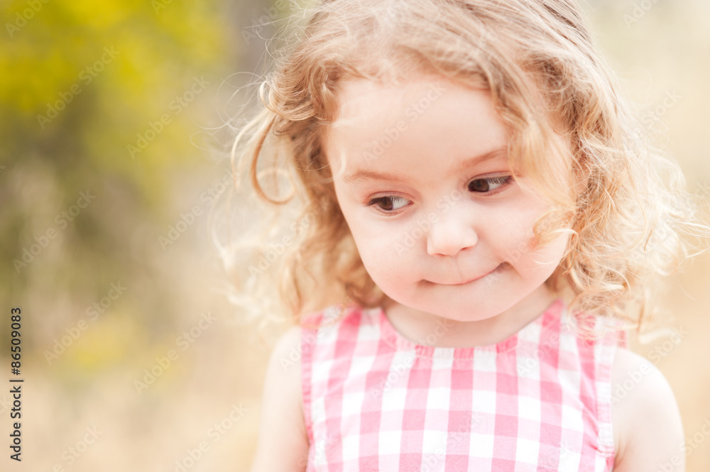 Close up portrait of cute baby girl 2-3 year old posing outdoors. Cute child. Looking away. Childhood. Close up portrait of cute baby girl 2-3 year old posing outdoors. Cute child. Looking away. Childhood.