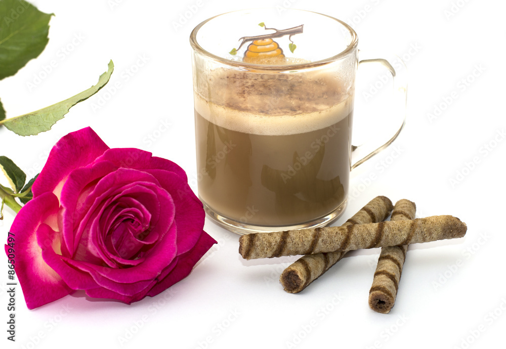 beautiful rose and cappuccino in the transparent mug beautiful rose and cappuccino in the transparent mug