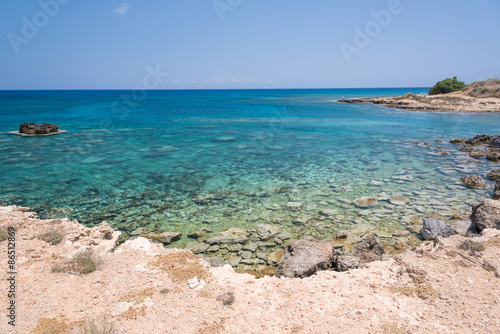 Crystal clear waters and sandstone rocks of the Mediterranean Se © JonikFoto.pl
