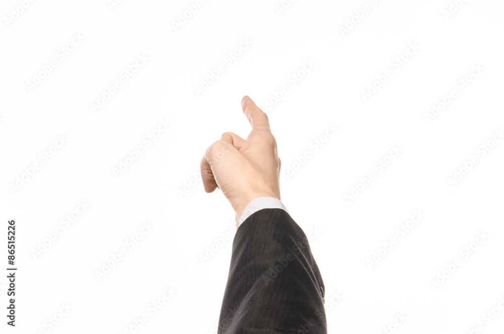 Gestures and Business theme: businessman shows hand gestures with a first-person in a black suit on a white background isolated Gestures and Business theme: businessman shows hand gestures with a first-person in a black suit on a white background isolated