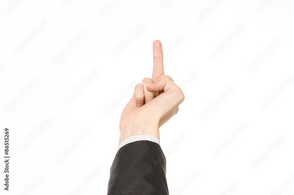 Gestures and Business theme: businessman shows hand gestures with a first-person in a black suit on a white background isolated Gestures and Business theme: businessman shows hand gestures with a first-person in a black suit on a white background isolated