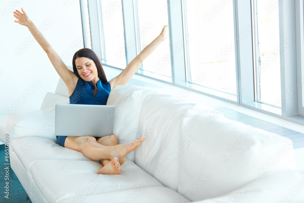 Happy Business Woman Celebrates Successful Deal at her Office. Happy Business Woman Celebrates Successful Deal at her Office.