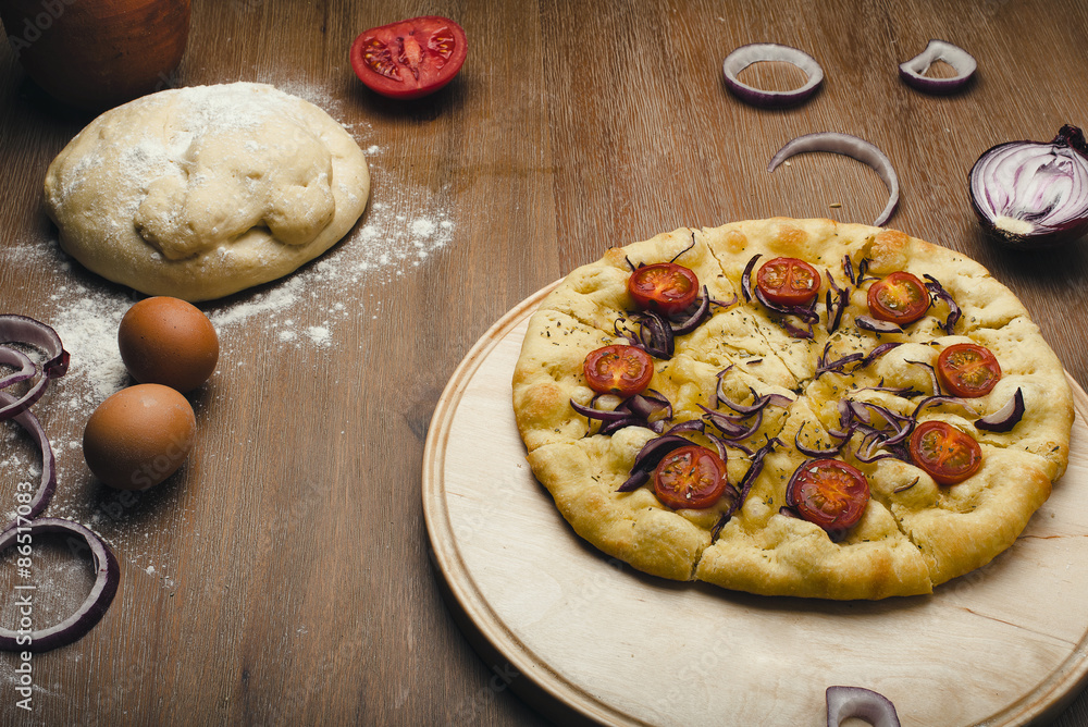delicious pizza focacia in composition with fresh vegetables