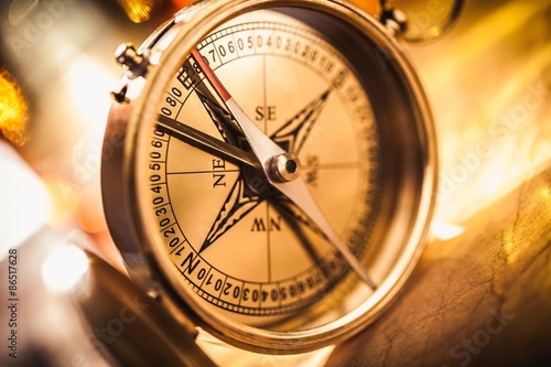 Compass, Gold, Discovery. photo