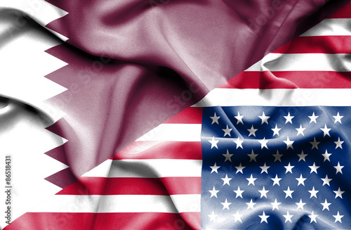 Fototapeta Naklejka Na Ścianę i Meble -  Waving flag of United States of America andQatar