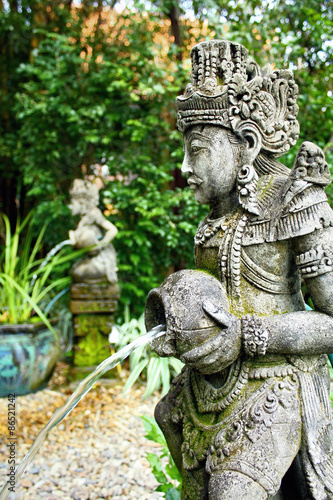 Water bearer garden statue