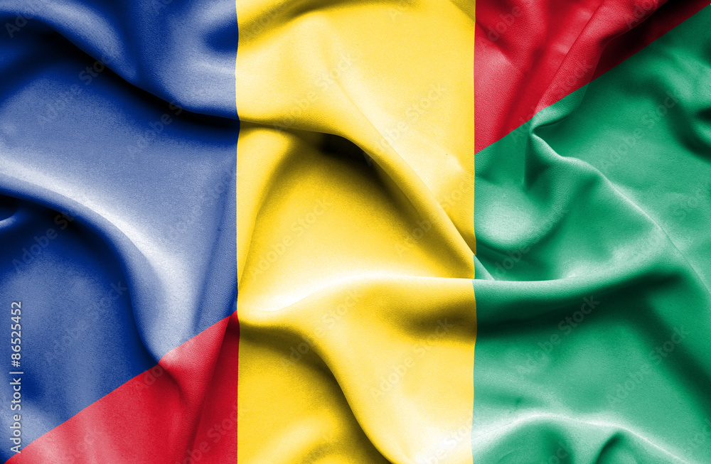 Waving flag of Guinea and Romania Waving flag of Guinea and Romania