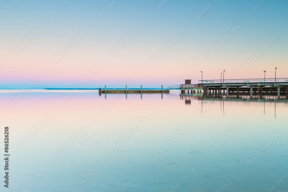 Beautiful wooden pier on Baltic sea shore