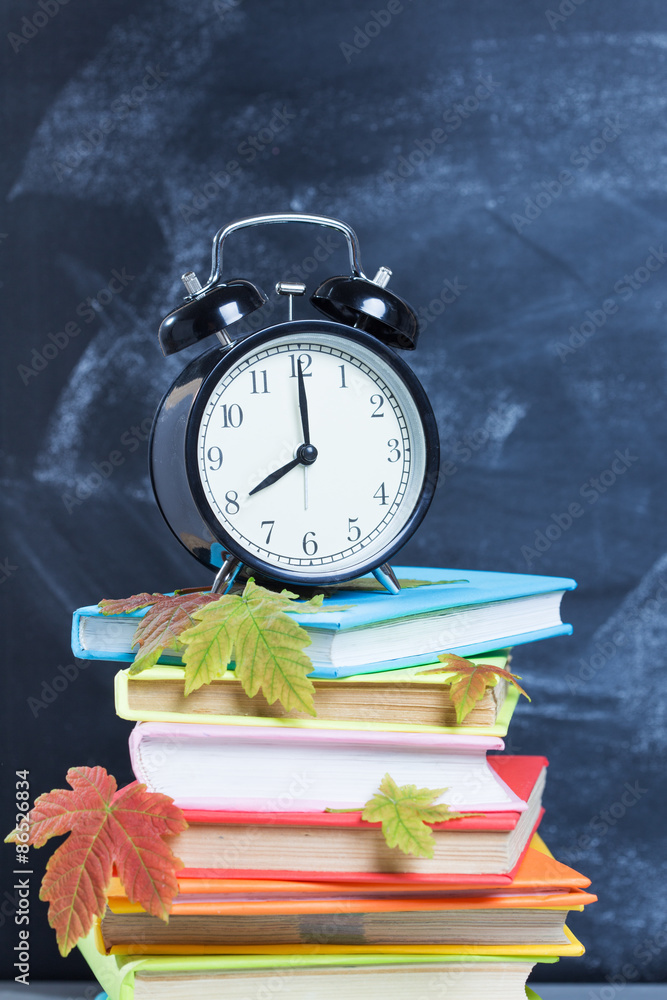Stack of Books and alarm clock Stack of Books and alarm clock