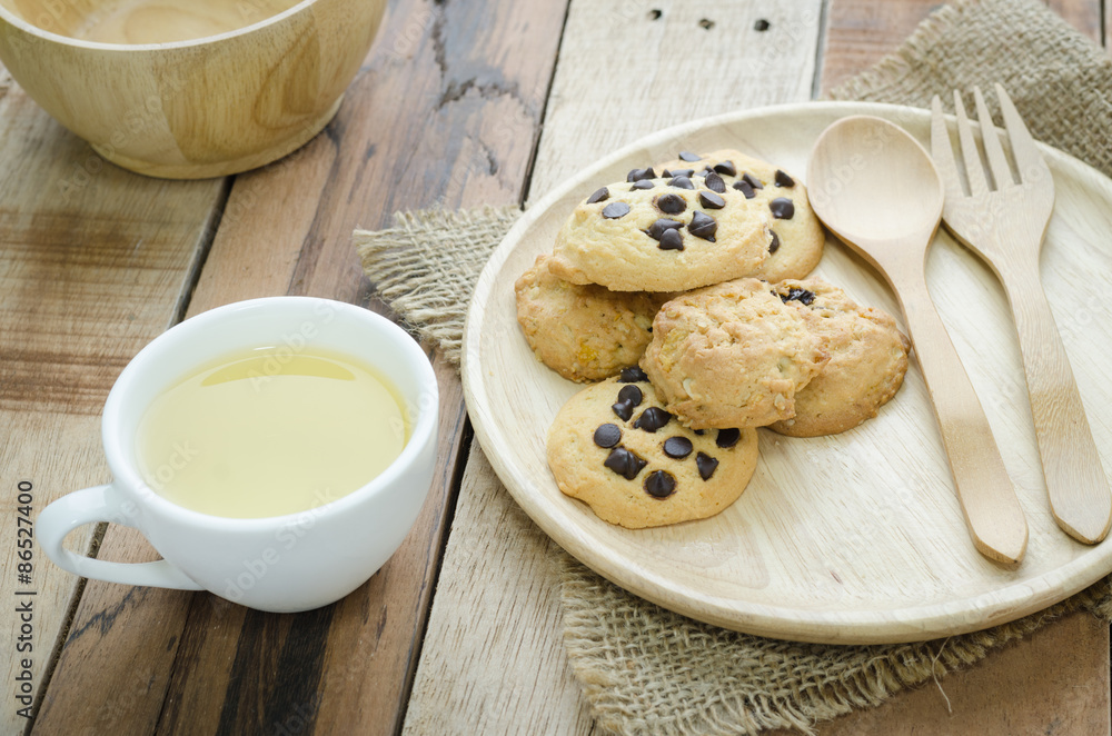 Cookies and tea on wood table