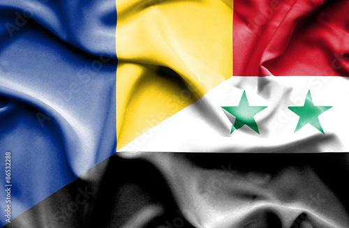 Waving flag of Syria and Romania