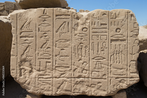 Фотография old egypt hieroglyphs carved on the stone