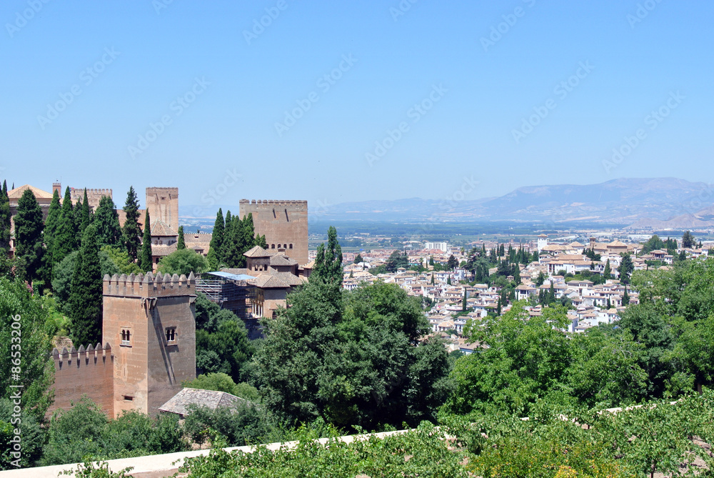 Panoramic view on Alhambra palace and the city of Granada in Andalusia, Spain, on a sunny day.