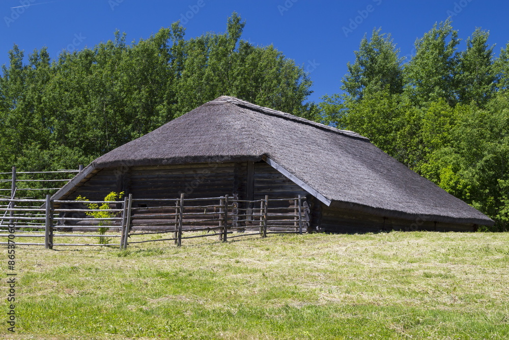 The ancient house in the Museum of Folk Architecture and Rural L The ancient house in the Museum of Folk Architecture and Rural L
