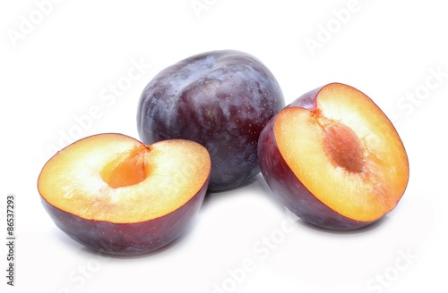 plums isolated on white