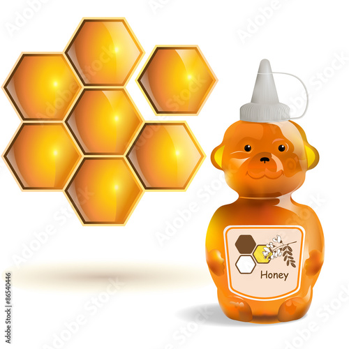 Honey Bear / Bottle with honey in the form of teddy bear. On the left side, near the bottle, there is a honeycomb.
