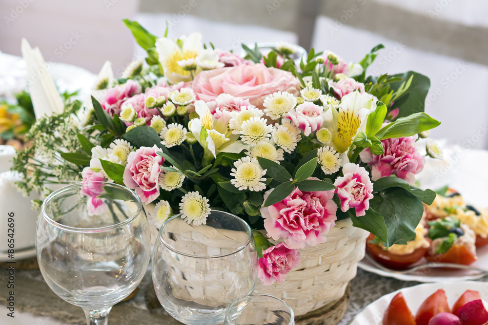 Festive bouquet of flowers on the table Festive bouquet of flowers on the table