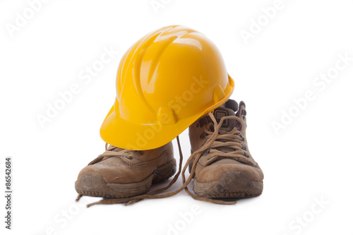 working boots and helmet isolated