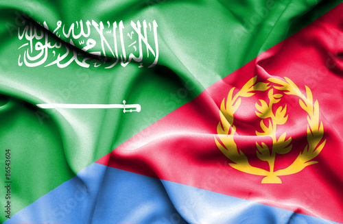 Waving flag of Eritrea and Saudi Arabia