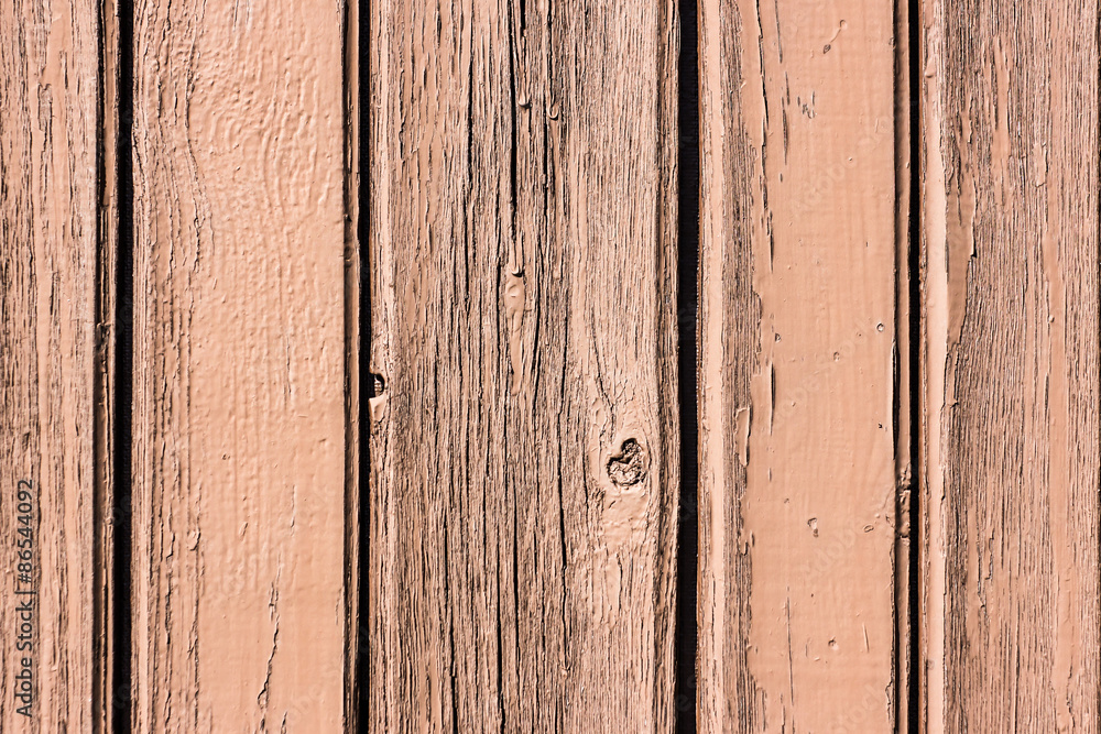 Naklejka premium Red paint wooden desks texture.