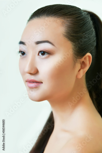 Portrait of beautiful young asian woman. Natural make-up.
