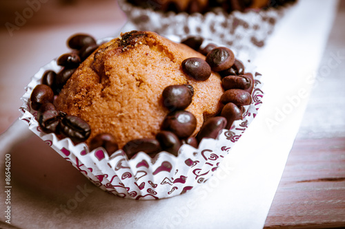 neapolitan pastry on coffee beans background photo