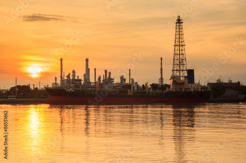 Oil refinery silhouette along the river at sunrise time (Bangkok, Thailand) © Southtownboy Studio