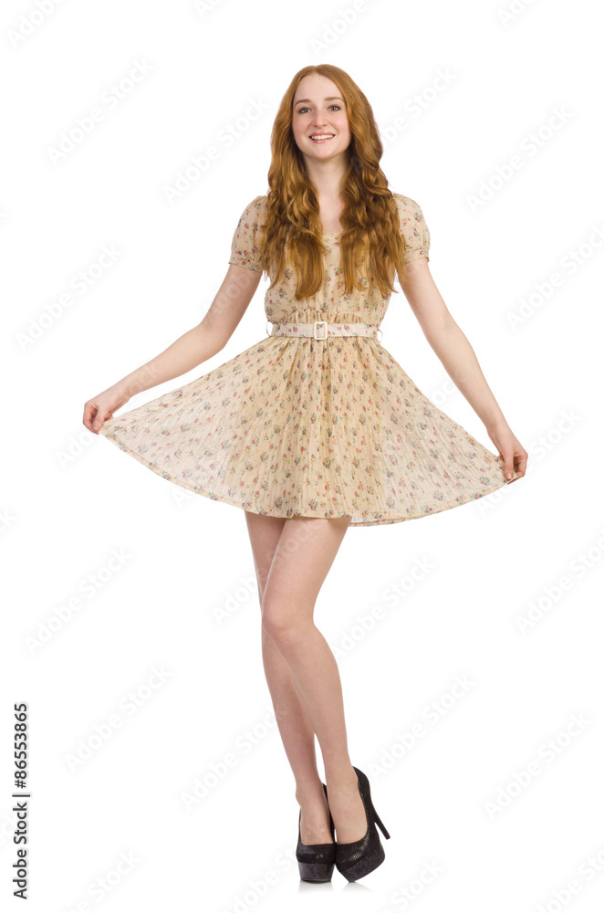 Pretty red hair girl in summer dress isolated on white