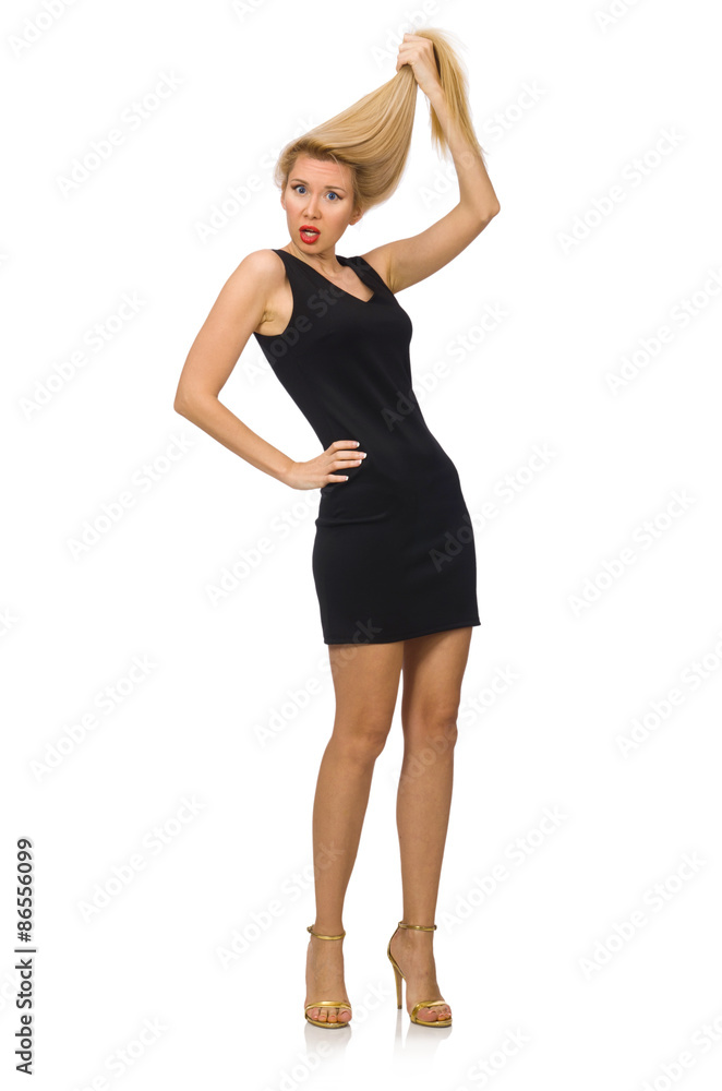 Fototapeta premium Young pretty woman in mini black dress isolated on white