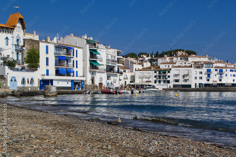 Nice view on white and blue houses in Cadaques in Spain