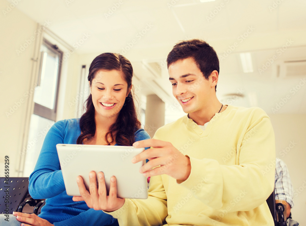 group of smiling students with tablet pc group of smiling students with tablet pc