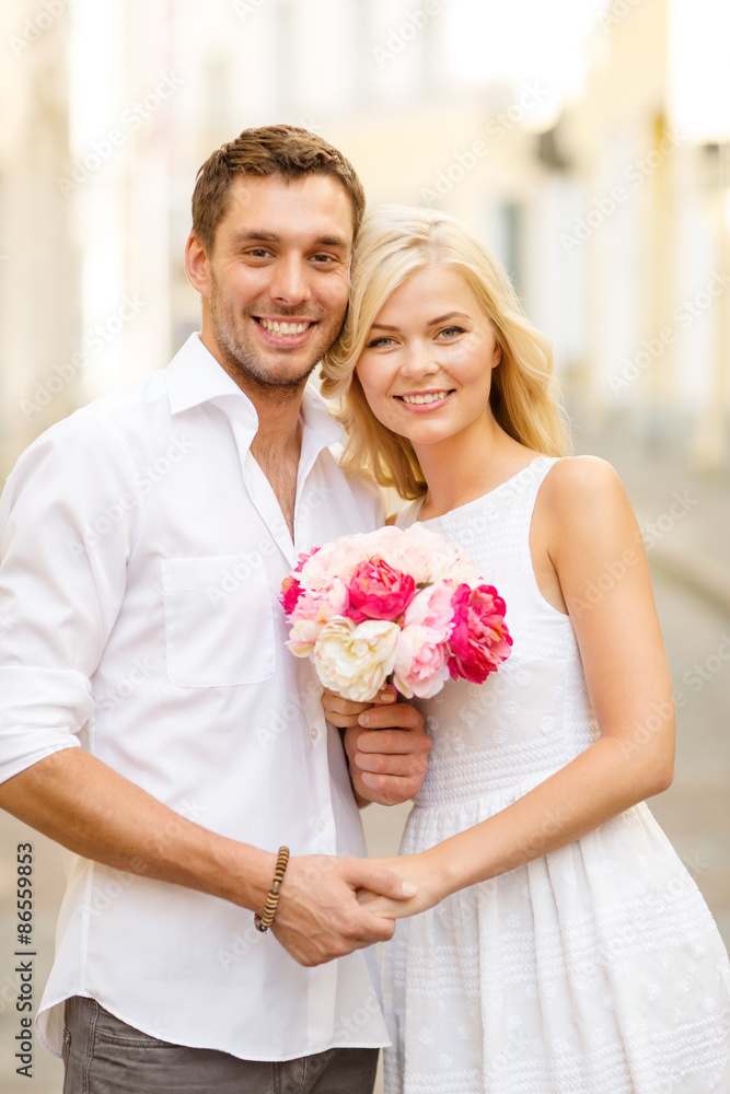 couple with flowers in the city couple with flowers in the city