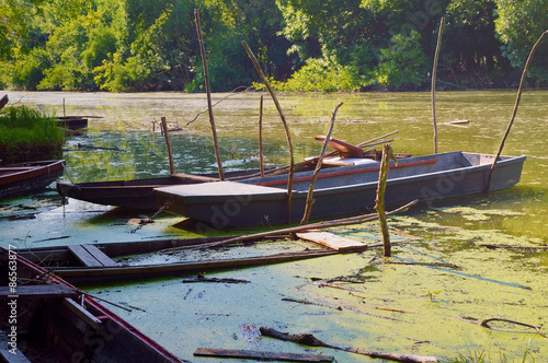 Old wooden fishing boat on the river