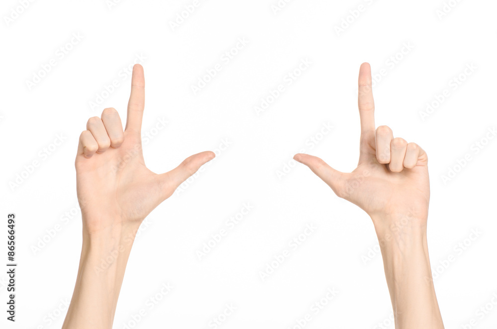 Hand gestures theme: the human hand shows gestures isolated on white background in studio Hand gestures theme: the human hand shows gestures isolated on white background in studio