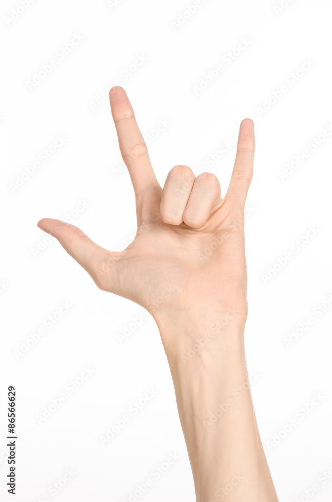 Hand gestures theme: the human hand shows gestures isolated on white background in studio Hand gestures theme: the human hand shows gestures isolated on white background in studio