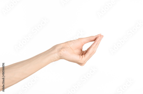 Hand gestures theme: the human hand shows gestures isolated on white background in studio
