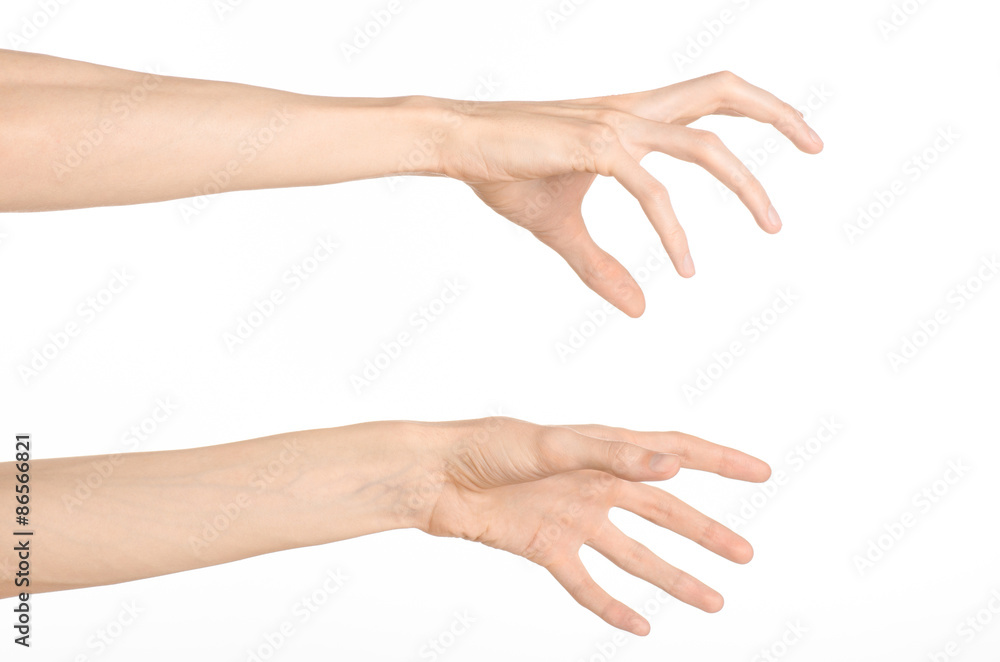 Hand gestures theme: the human hand shows gestures isolated on white background in studio Hand gestures theme: the human hand shows gestures isolated on white background in studio