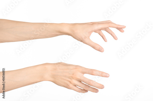 Hand gestures theme: the human hand shows gestures isolated on white background in studio