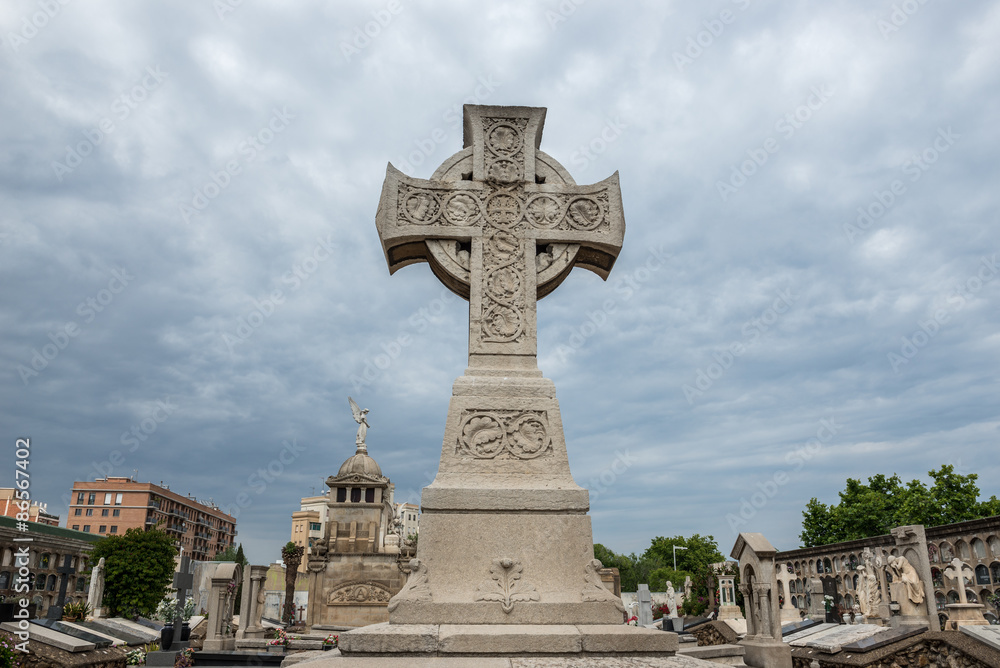 cross shaped gravestone at Poblenou Cemetery in Barcelona, Spain