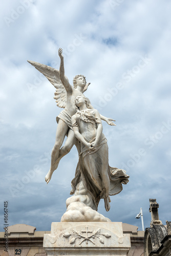 grave sculpture at Poblenou Cemetery in Barcelona, Spain