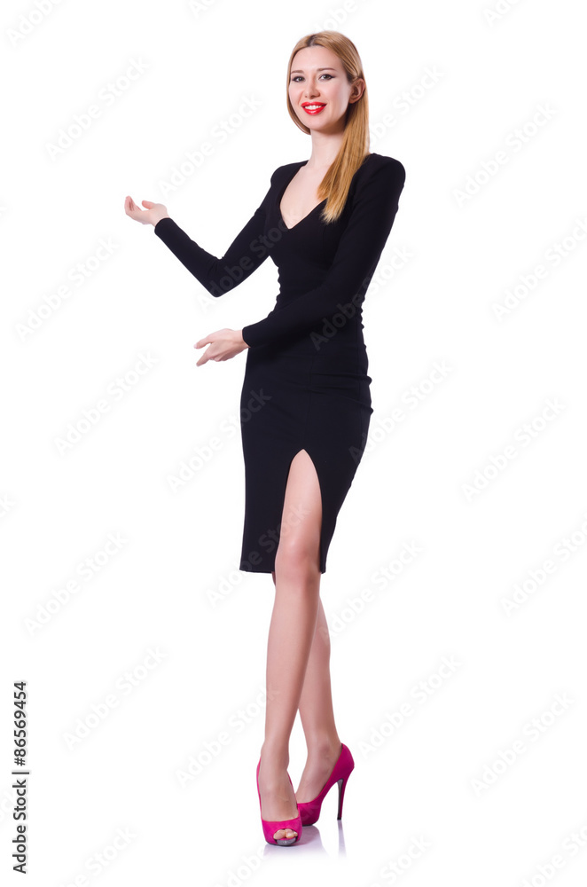 Young blonde girl in black dress showing isolated on white Young blonde girl in black dress showing isolated on white
