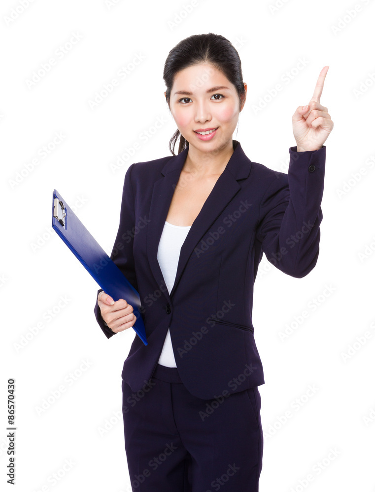 Businesswoman holding with clipboard and finger point up Businesswoman holding with clipboard and finger point up
