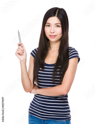 Asian woman with pen pointing up