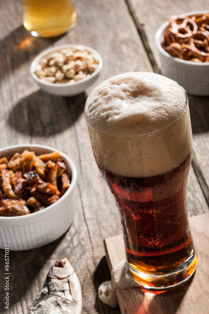 Dark beer with snacks Dark beer with snacks