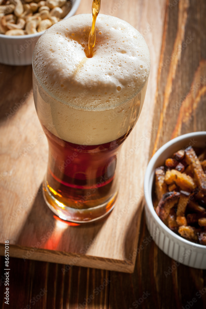Dark beer with snacks Dark beer with snacks