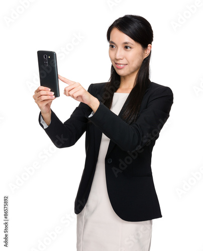 Asian businesswoman using the cellphone for takinf photo photo