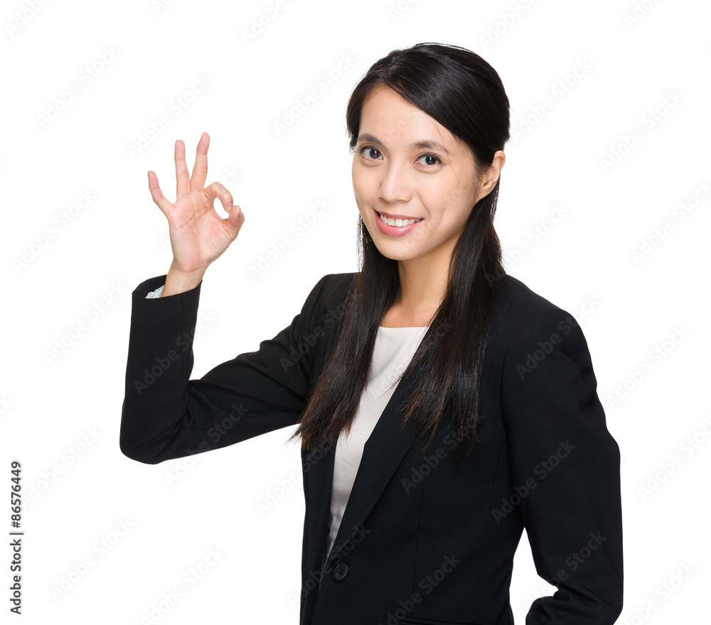 Young businesswoman with ok sign gesture Young businesswoman with ok sign gesture