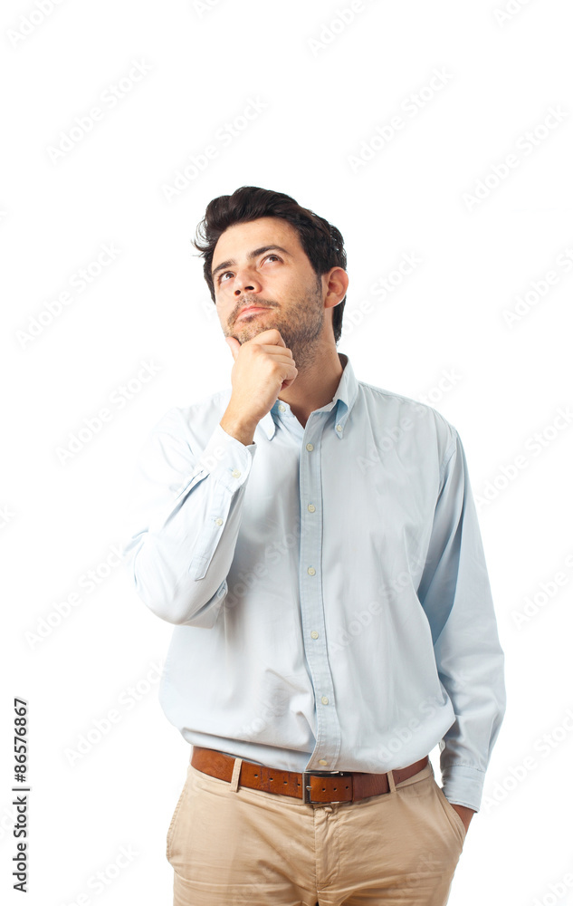 young man thinking on a white background young man thinking on a white background
