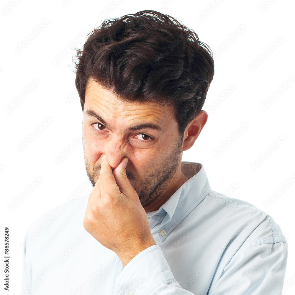 man with stink gesture on a white background